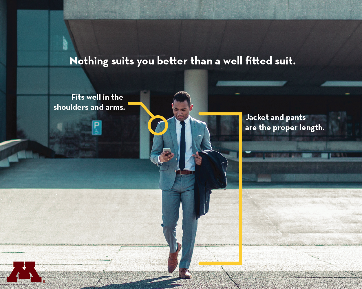 photo of man leaving building wearing a suit, phone in hand - \
