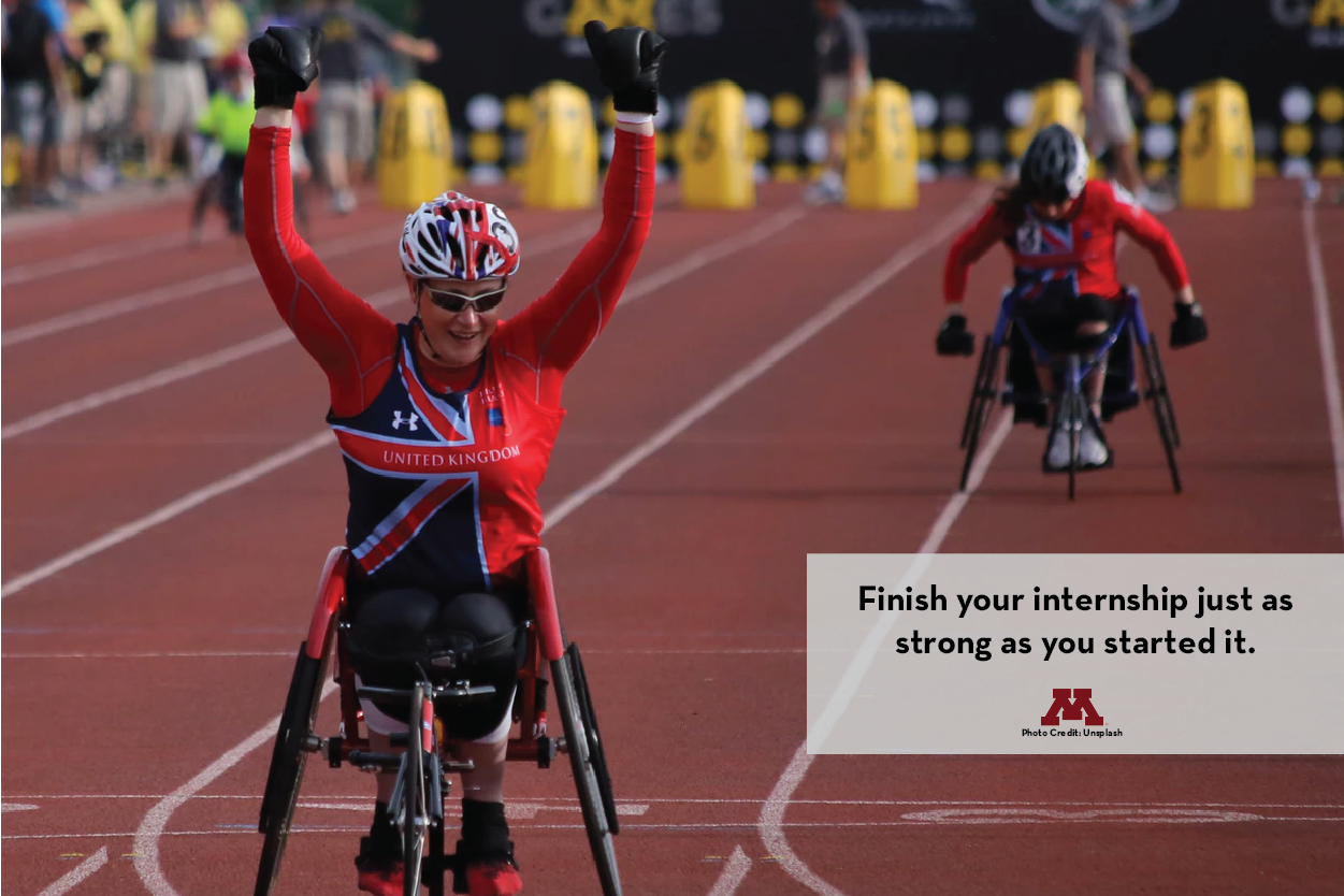 Photo of athletes in wheelchairs completing a track race title=